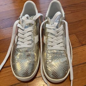 Gold and white Stuart Witzman size 7 Tennis Shoes. Only worn once!